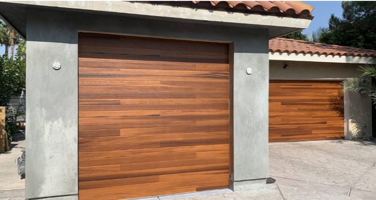Modern horizontal slat timber garage doors on a desert property