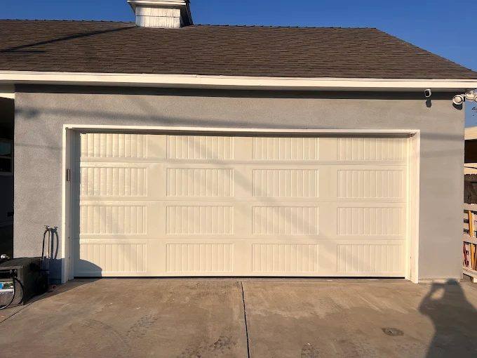 Cream long-panel steel garage door on a home in the Palo Verde Valley